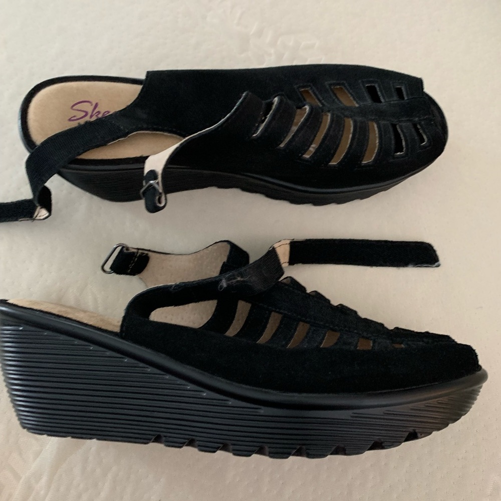 Black Skechers sandals
